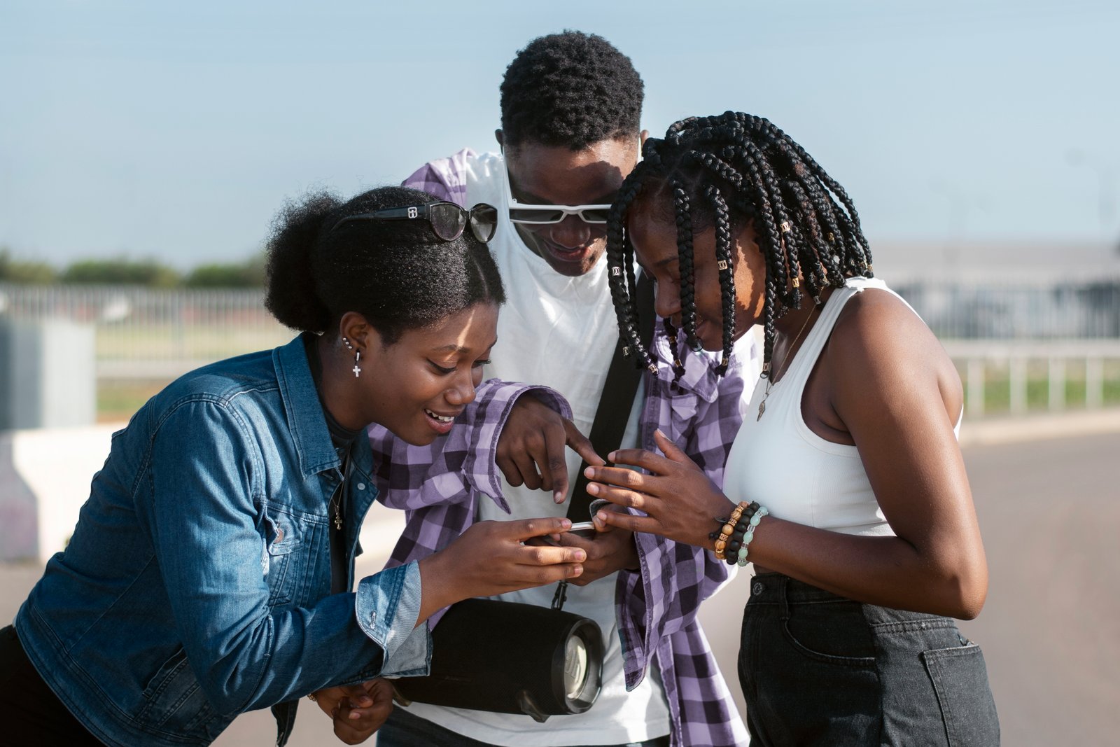 Friends looking at phone